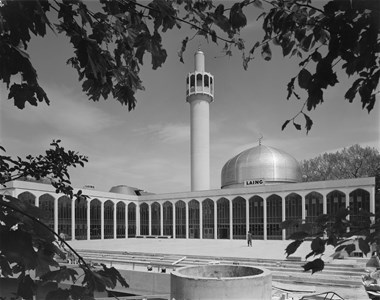 A view of the London Central Mosque taken from the west, showing the arcaded elevations of the northern and eastern ranges.