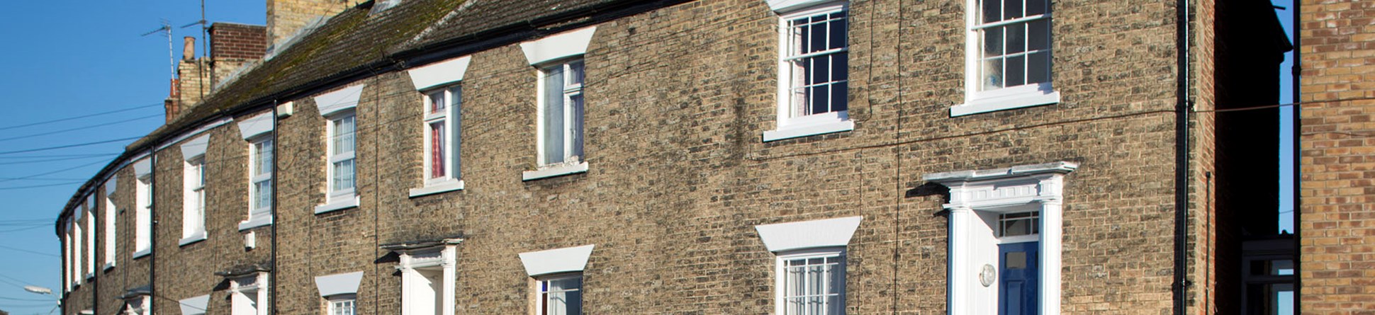 View of terraced housing which curves around a corner