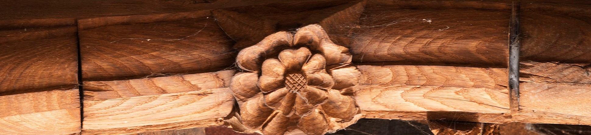 Interior close up of a decorated roof timber at the Grade II* listed 31 High Street, Droitwich Spa.