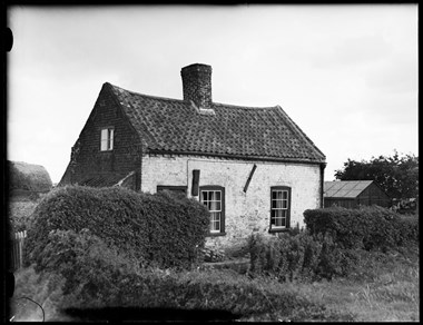 Archive photograph of vernacular buildings.