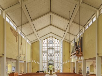 The present west end is formed by a glass screen. Interior view showing relationship of 60's church to the Hawksmoor tower. View from east.